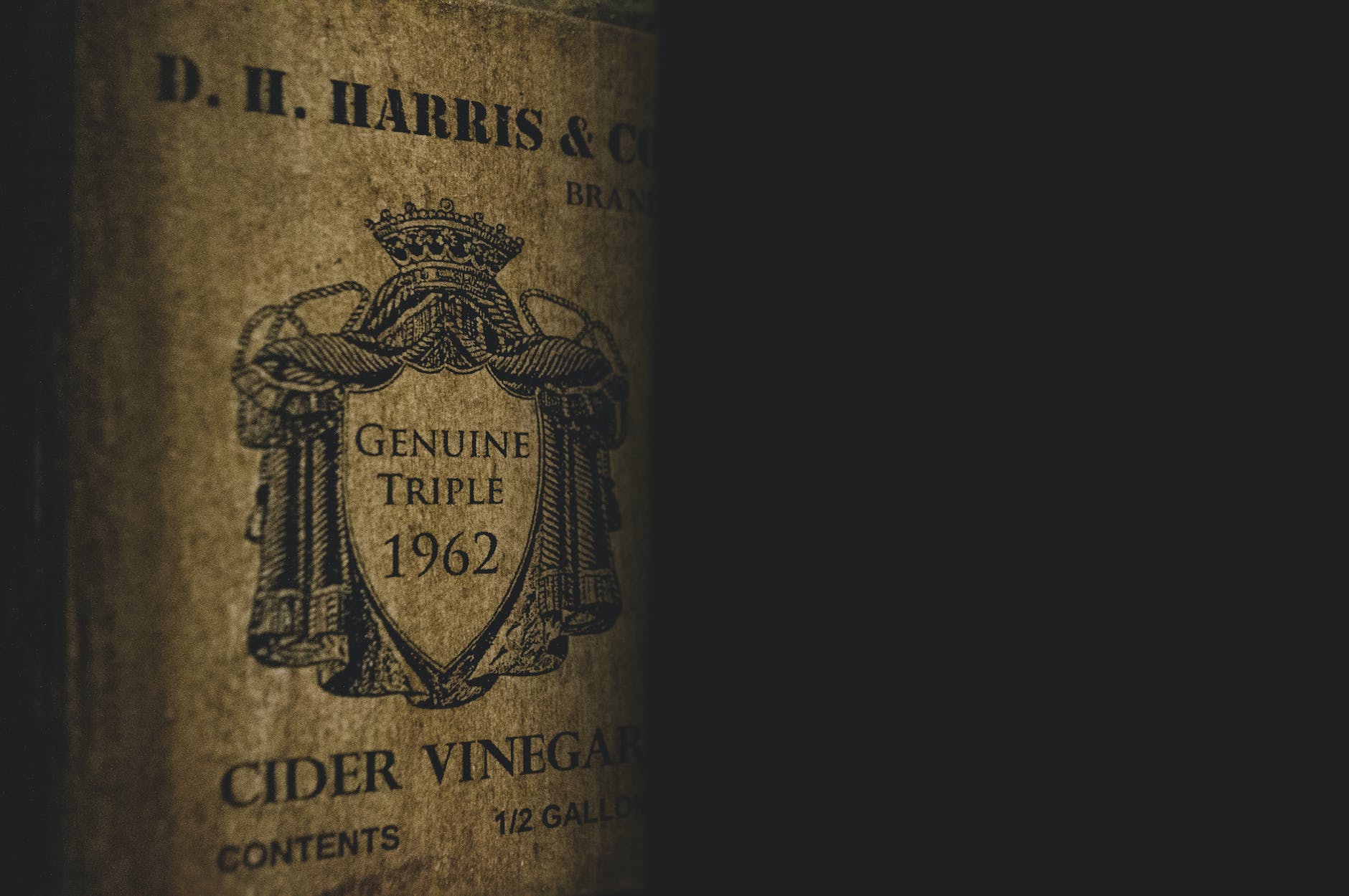 a vintage genuine triple cider vinegar label in close up shot