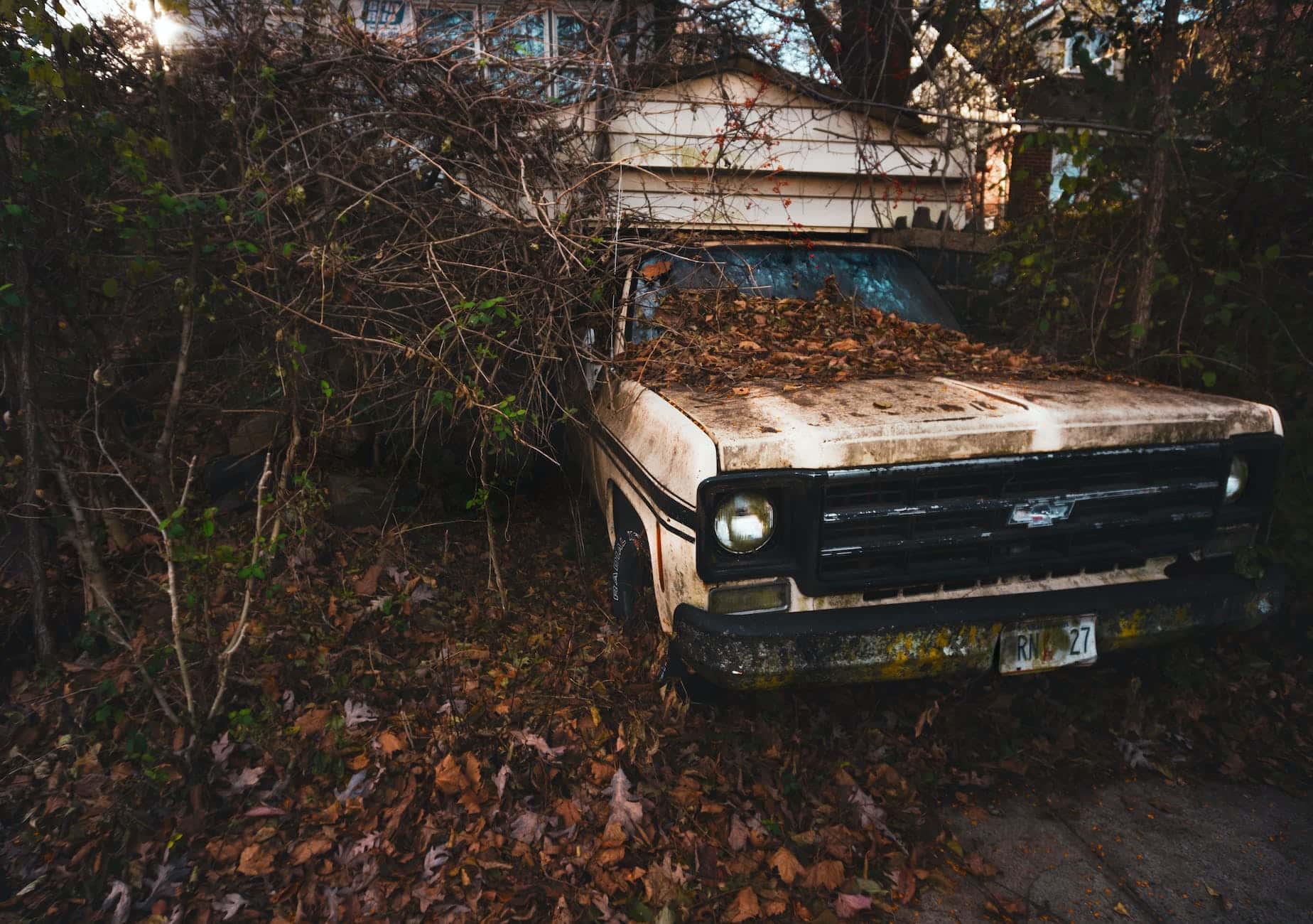 photo of an abandoned car